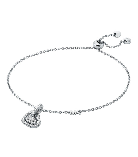 Silver Michael Kors bracelet in close-up view, showcasing its elegant design with crystal accents, reflecting sophistication.