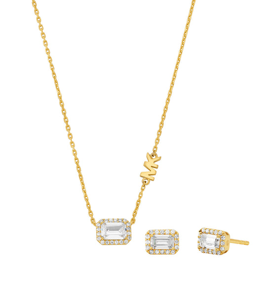 Gold-colored Michael Kors necklace set with intricate designs, beautifully captured from a vertical angle, exuding elegance and luxury.
