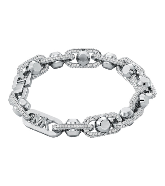 Michael Kors silver bracelet elegantly displayed at a slight angle, showcasing its intricate design and polished finish.