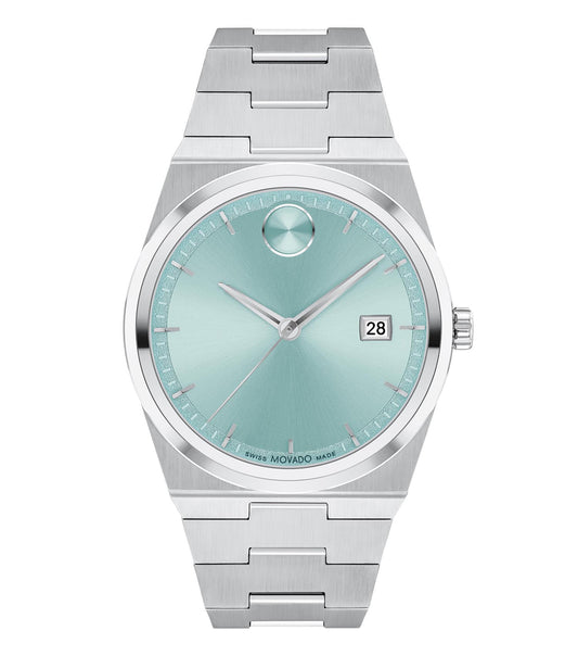 Movado watch in Quest color with sleek black dial and elegant silver strap, showcased at a subtle angle, exuding timeless luxury.
