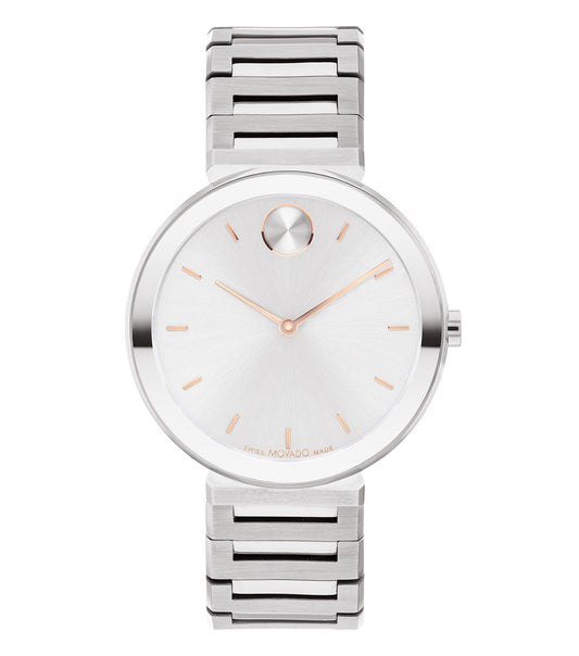 Movado watch in silver tone with minimalist design, featuring a sleek dial and bracelet band, captured in a side angle.