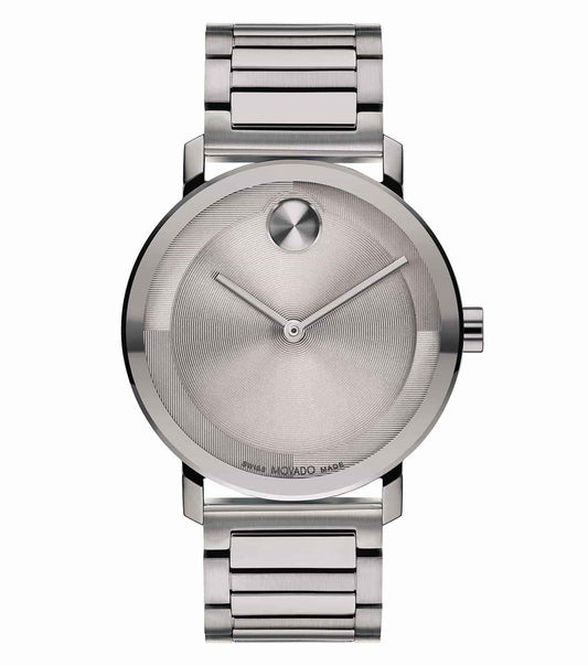 Movado watch with a striking bold blue dial, silver accents, and elegant circular design, angled elegantly for a sleek view.