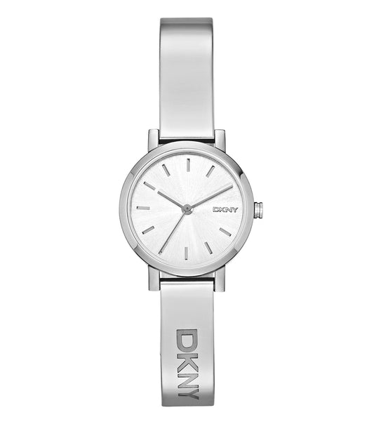 DKNY Quartz watch with a gold-tone finish, styled in an upward angle, showcases modern elegance and minimalist design.
