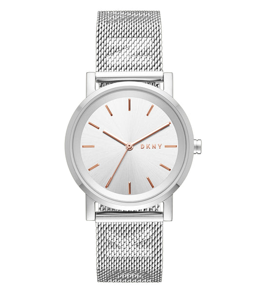 DKNY watch in silver with minimalistic round face, sleek mesh strap, side angle, showcasing elegant and modern design.