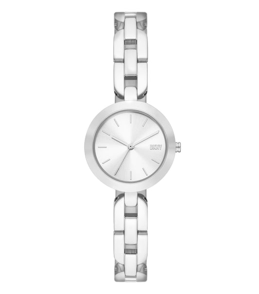 DKNY women's silver-tone watch featuring a minimalist round dial with a comfortable stainless steel strap, side angle view.