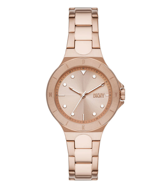 Rose gold DKNY watch with a sleek round dial, side angle view, showcasing its elegant straps and minimalist design.