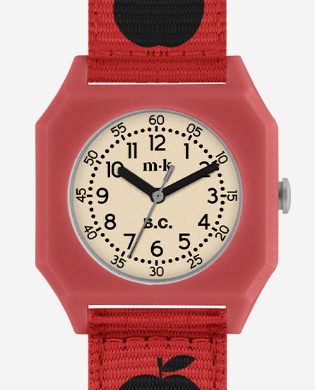 Mini Kyomo watch in none color, square face design with subtle playful details, aerial view showcasing unique style.