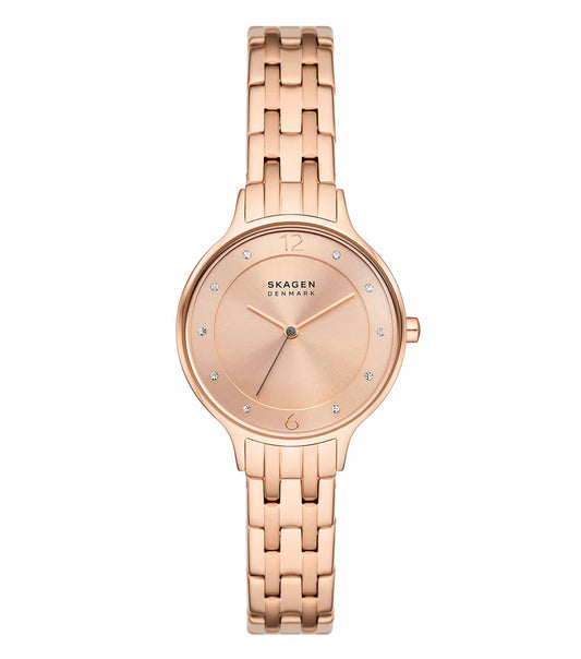 Rose gold Skagen watch featuring a minimalistic design with a mesh band, captured at a 30-degree angle, exuding elegance.