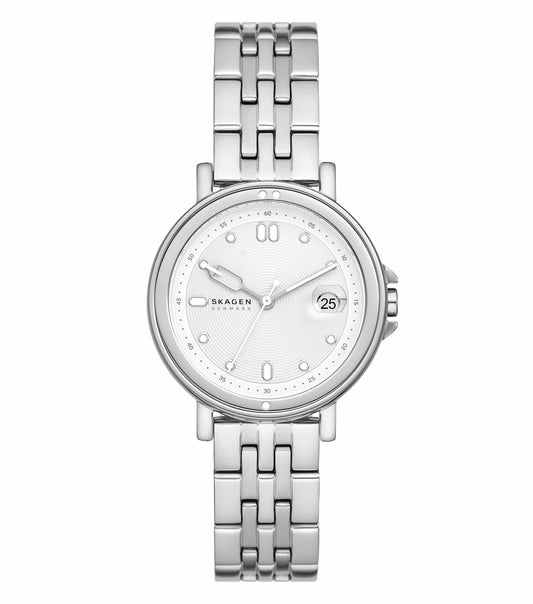 A front-facing view of a Skagen watch in Lille color, showcasing its sleek minimalist design and silver mesh band against a white background.