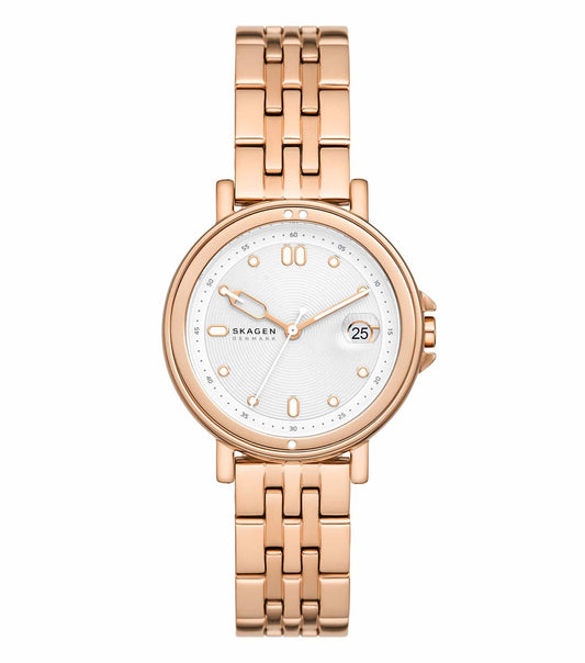 Skagen Lille color watch with brown leather strap and sleek silver casing, angled view showcasing minimalist design.