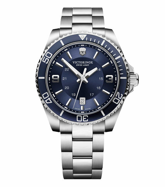 Victorinox Swiss Army quartz watch in striking coral hue, angled side view, highlights sleek design and craftsmanship.