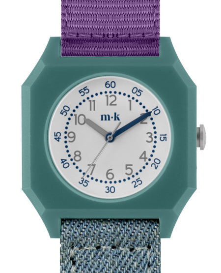 Emerald green Mini Kyomo watch with square face, side angle view; sophisticated design with a minimalist band and elegant case.